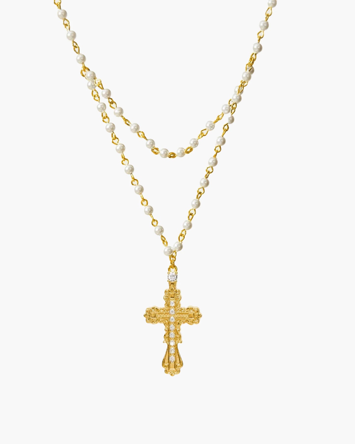 Everette Cross Necklace by PressureDen.store featuring a sleek silver cross pendant on a delicate chain, stylish and timeless jewelry.