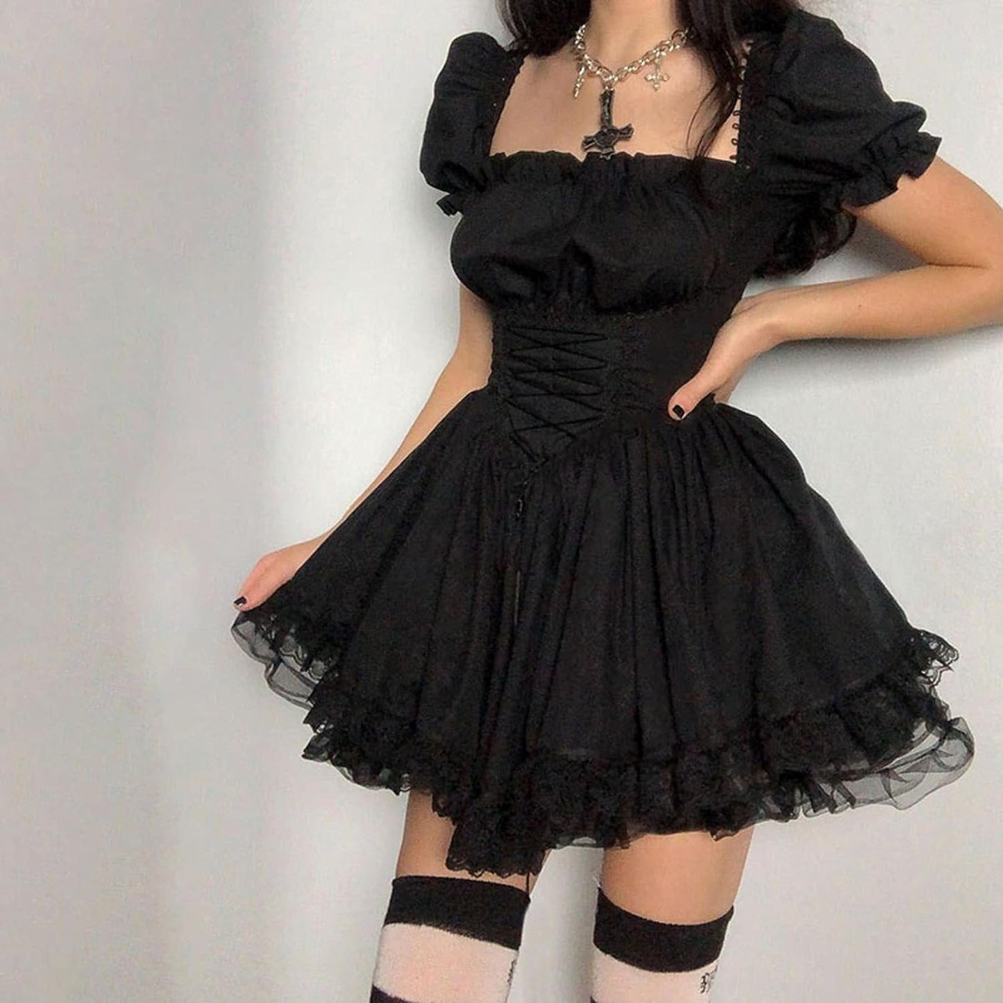 Vintage punk gothic Lolita mini dress with puff sleeves, A-line swing style, featuring dark, edgy details and intricate fabric patterns.