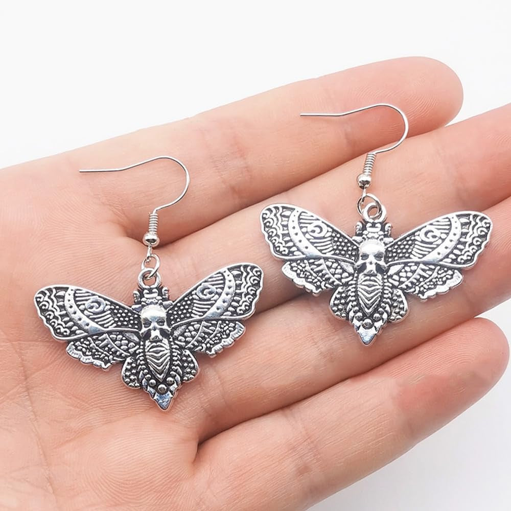 Silver butterfly and luna moth dangle earrings set featuring gothic punk crescent moon and star drops by Weenkeey.
