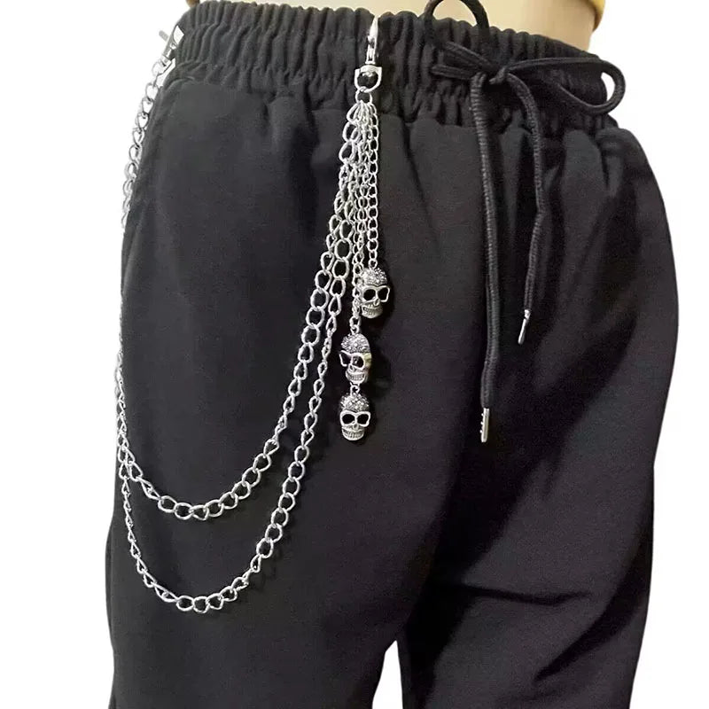 Layered punk spike and chain keychains for men and women, featuring edgy designs perfect for jeans and biker style accessories.