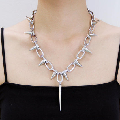 Silver spiked choker necklace with rivets and chain detail, unisex goth jewelry perfect for parties and nightclubs.