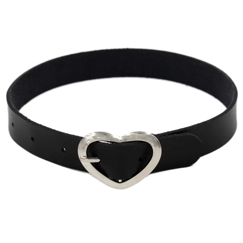Black leather choker necklace with edgy metal spikes, gothic punk jewelry suitable for parties and festivals.