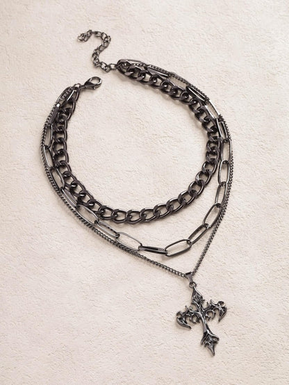 Sacina Gothic layered cross choker necklace with dark metal chains, perfect for emo, grunge, and Halloween-inspired jewelry styles.