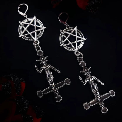 Dark gothic earrings featuring inverted pentagram and Baphomet design, perfect for goth and punk fashion enthusiasts.