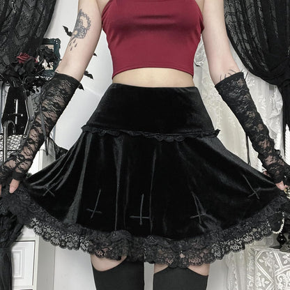 Gothic velvet mini skirt for women featuring a high waist, punk grunge emo fashion style, shown in black fabric.