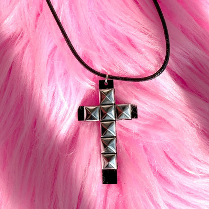 Edgy 90s punk rivet cross pendant necklace for women, featuring grunge rock style and metal detailing.