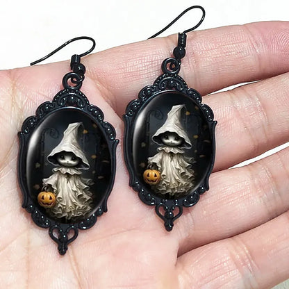 Gothic witch cameo dangle earrings with vintage crystal glass accents, Victorian jewelry style, featuring punk-inspired design.