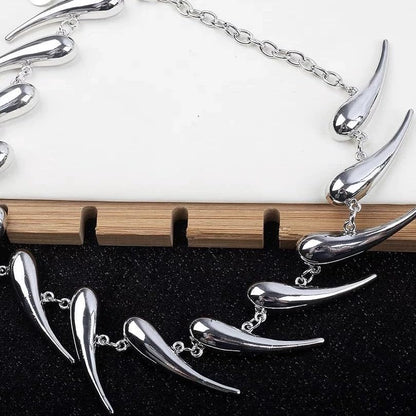 Edgy handmade silver spike choker necklace by CheeseMine featuring adjustable punk goth collar with metal spikes.