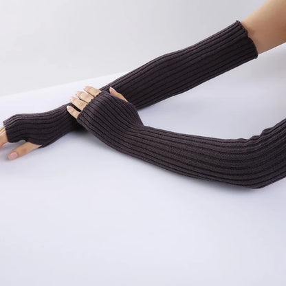 Chic long fingerless gloves for women, soft knitted winter arm warmers with gothic punk style and casual design.