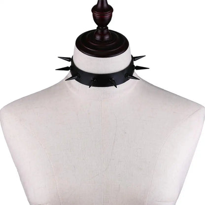 Black spiked vegan leather choker necklace with edgy design, ideal for goth, witch, and cosplay styles.