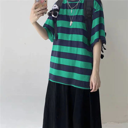 Black and white striped oversized goth punk T-shirt for women with Harajuku and hip hop style, featuring bold print and loose fit.