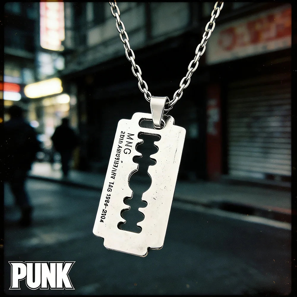 Y2K aesthetic razor blade pendant necklace by PressureDen.store, edgy vintage punk goth grunge jewelry for men and women