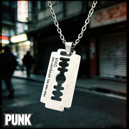Y2K aesthetic razor blade pendant necklace by PressureDen.store, edgy vintage punk goth grunge jewelry for men and women