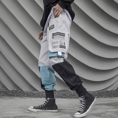 Men's blue tactical techwear harem pants featuring cargo pockets and a cyberpunk jogger style, size XL, from PressureDen.store