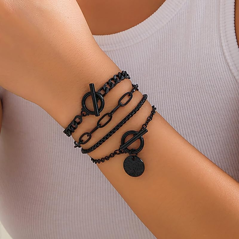 Stackable black bracelets set by SAVNOJW featuring gold coins and vintage chains, ideal for gothic, Y2K, or Halloween fashion.