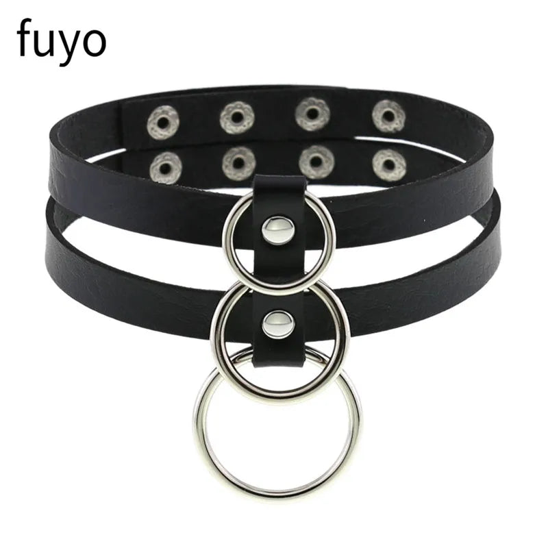 Black PU leather gothic choker necklace with a heart pendant, perfect punk accessory for grunge style and parties.