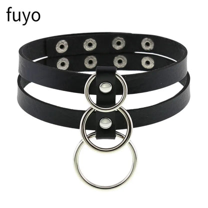 Black PU leather gothic choker necklace with a heart pendant, perfect punk accessory for grunge style and parties.