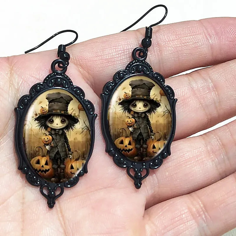 Vintage Gothic witch cameo dangle earrings with crystal glass accents, Victorian punk style jewelry featuring mystical design by PressureDen.