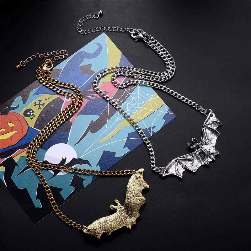 Gothic dragon, bat, eagle, heart, and rose pendant necklace with intricate metal design, worn as unique costume jewelry for men and women.