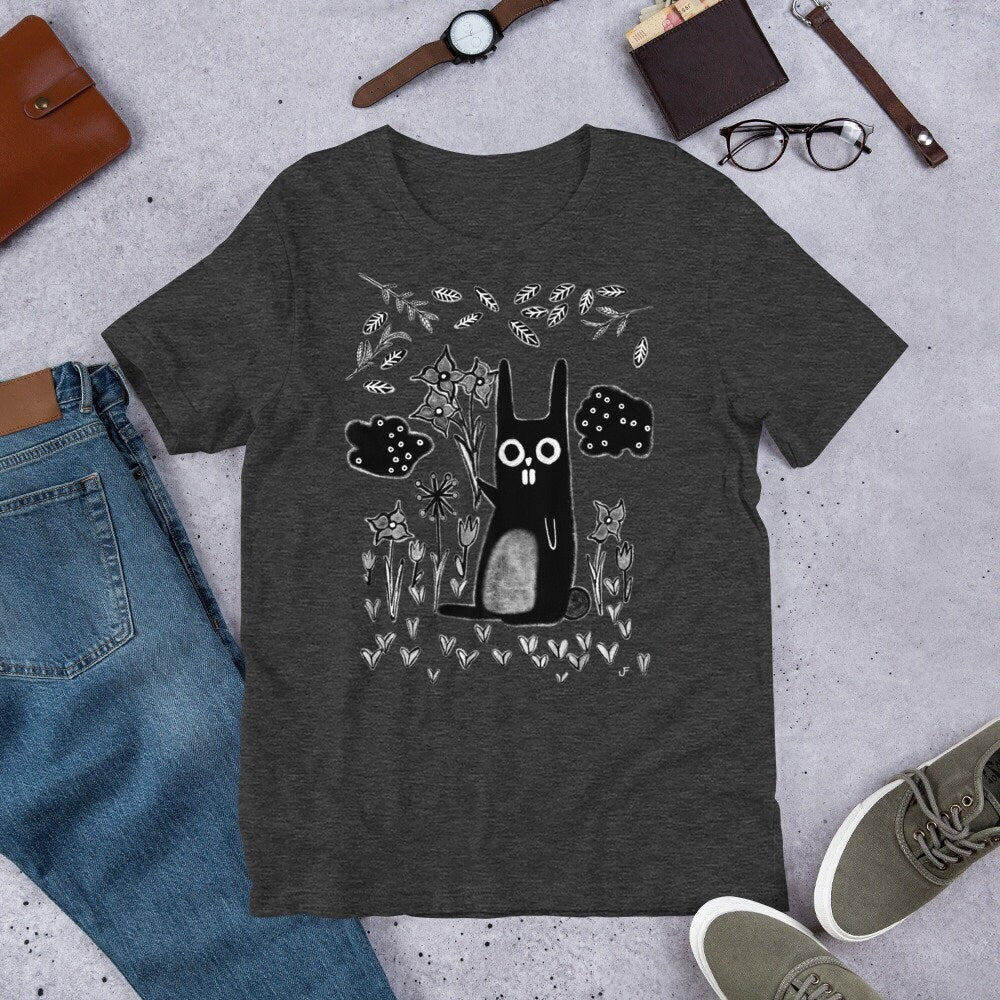 Whimsical garden rabbit T-shirt from PressureDen.store featuring a quirky gothic emo design, perfect for birthdays or housewarmings.