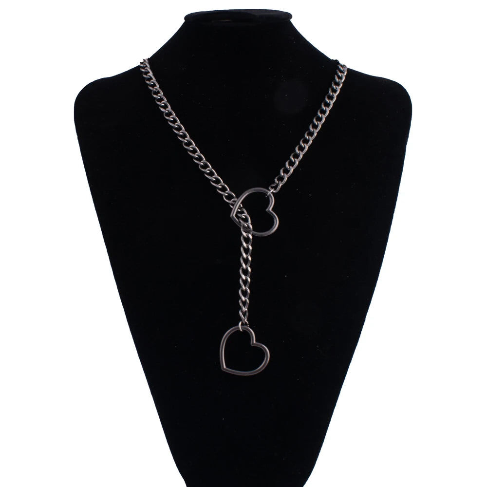 Stylish heart slip chain choker necklace, punk rock goth jewelry for women with a bold heart pendant and layered chain design.