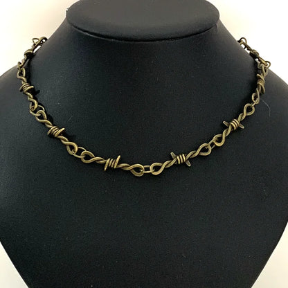 Gothic heart choker necklace with barbed wire design, hip-hop inspired jewelry for women, featuring edgy, bold style.