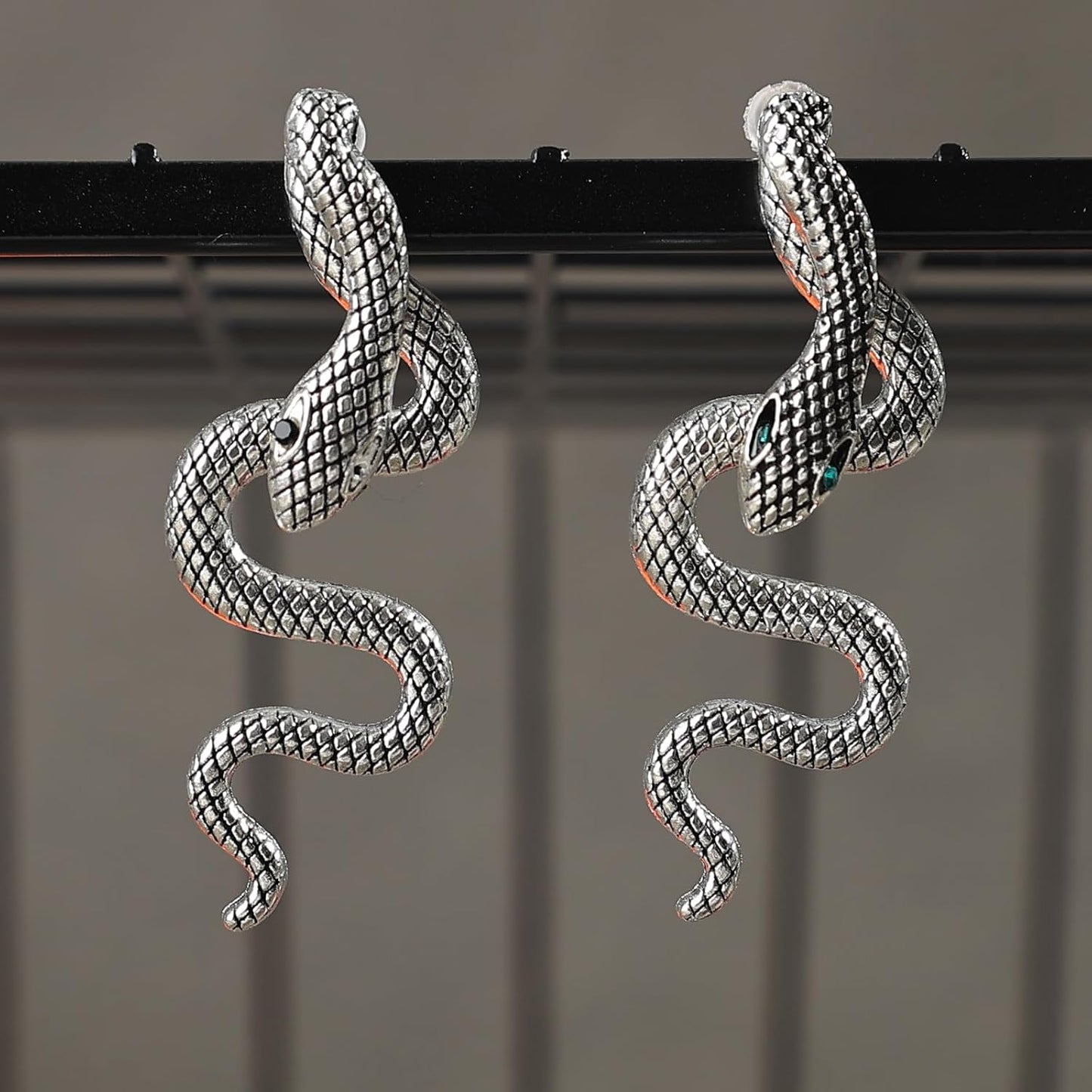 Vintage gothic snake earrings by JSLOVFLO featuring gold and silver design, perfect for Halloween and statement jewelry.