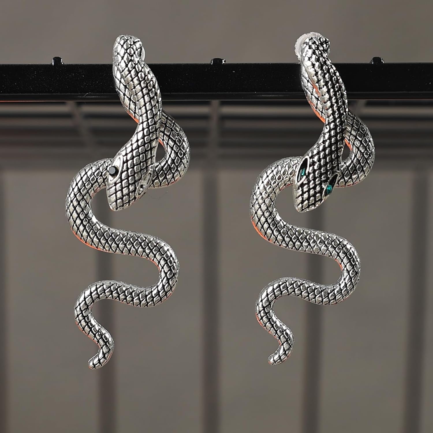 Vintage gothic snake earrings by JSLOVFLO featuring gold and silver design, perfect for Halloween and statement jewelry.