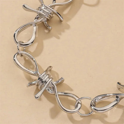 Vintage punk barbed wire choker necklace from PressureDen.store featuring edgy gothic style jewelry.