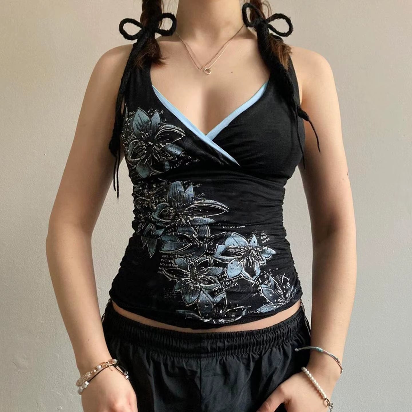 Black printed suspender vest for women, Y2K goth slim V-neck top with American retro style, from PressureDen.store