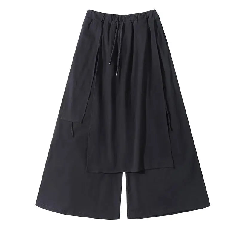 Black wide-leg techwear pants for men, featuring a gothic streetwear style with a relaxed fit and modern design.