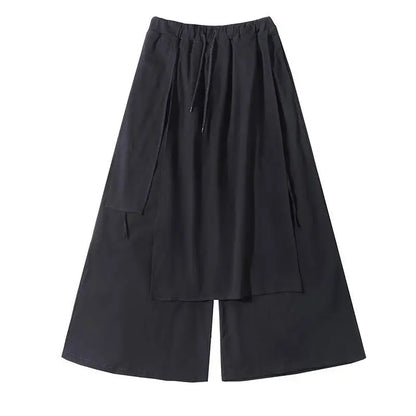 Black wide-leg techwear pants for men, featuring a gothic streetwear style with a relaxed fit and modern design.