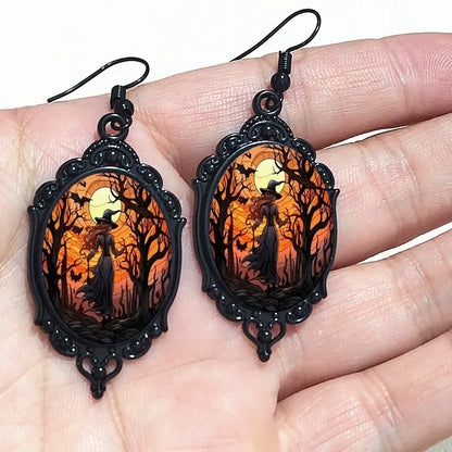 Gothic witch cameo dangle earrings with vintage crystal glass accents and Victorian punk style jewelry design.