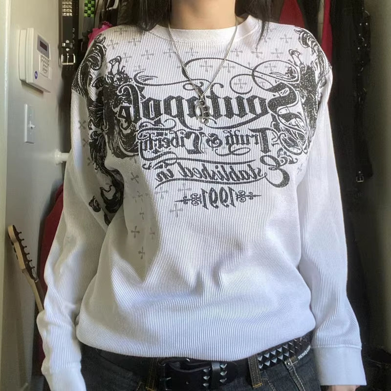 Women’s Y2K Cyber Grunge long sleeve T-shirt with patchwork design, gothic style top, featuring retro Harajuku and E-girl fashion elements.
