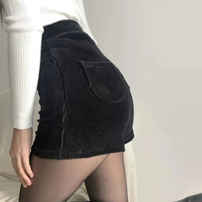 High-waisted black goth shorts for women with stretch corduroy fabric, casual Y2K style fashion pants.