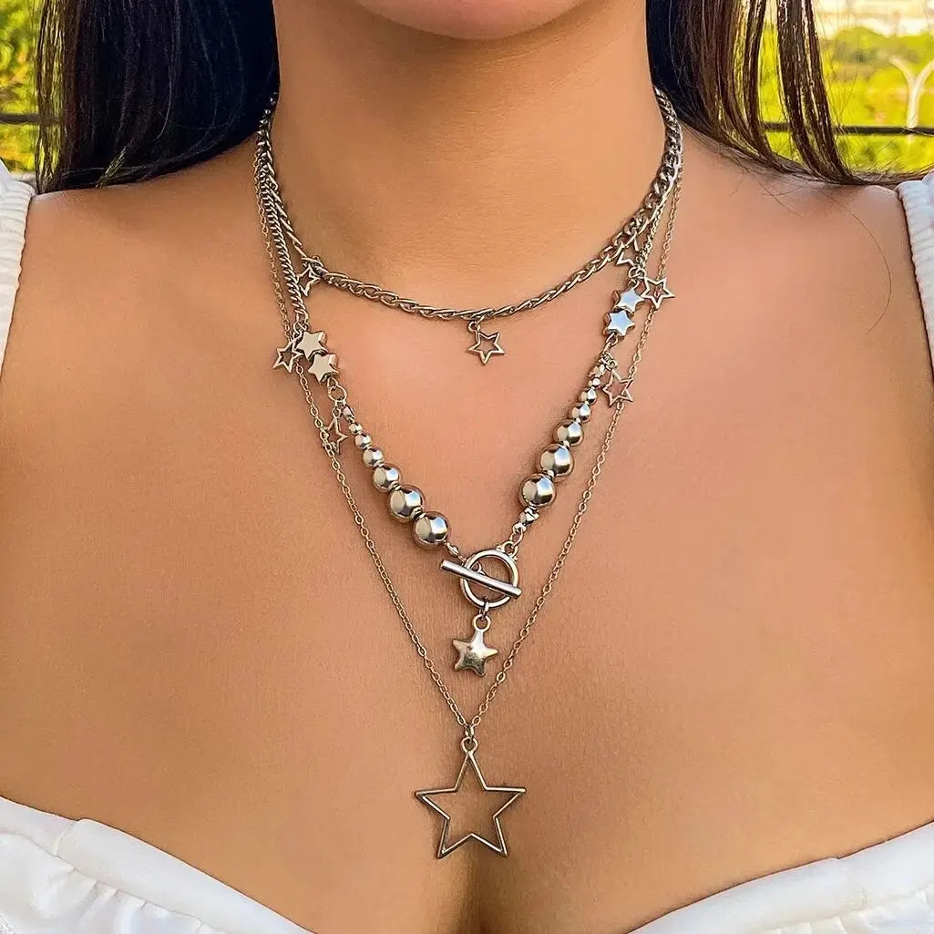 Vintage silver star OT buckle pendant choker necklace set with goth aesthetic jewelry for women, includes three pieces with intricate designs.