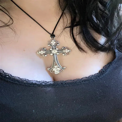 Rhinestone cross choker necklace with spiral design, gothic punk style jewelry for women, featuring sparkly rhinestones and edgy fashion.