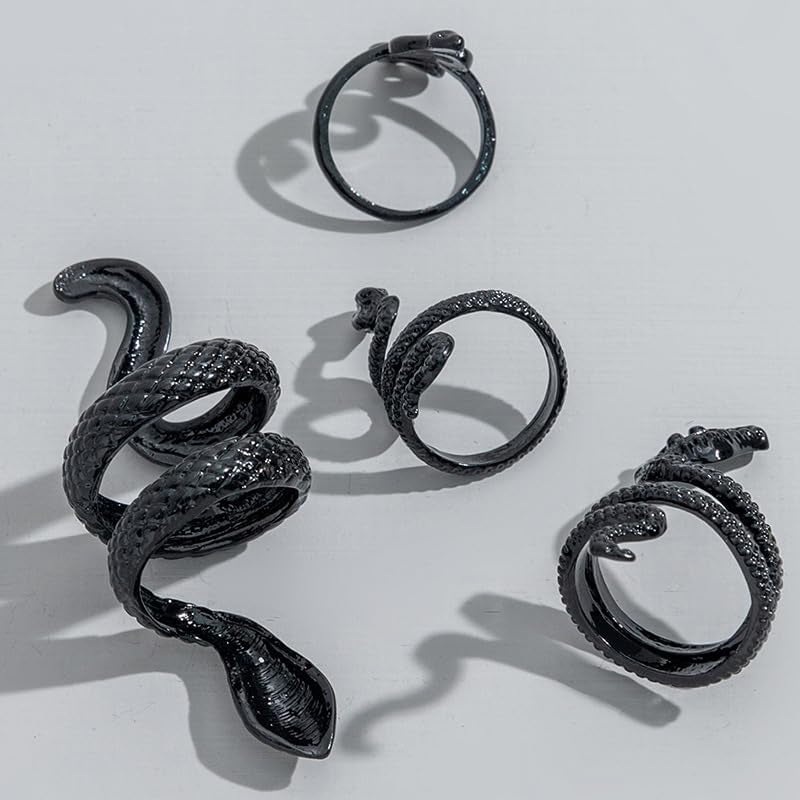 Set of three adjustable black snake rings by ONBRIG, vintage gothic punk jewelry for women featuring snake designs.