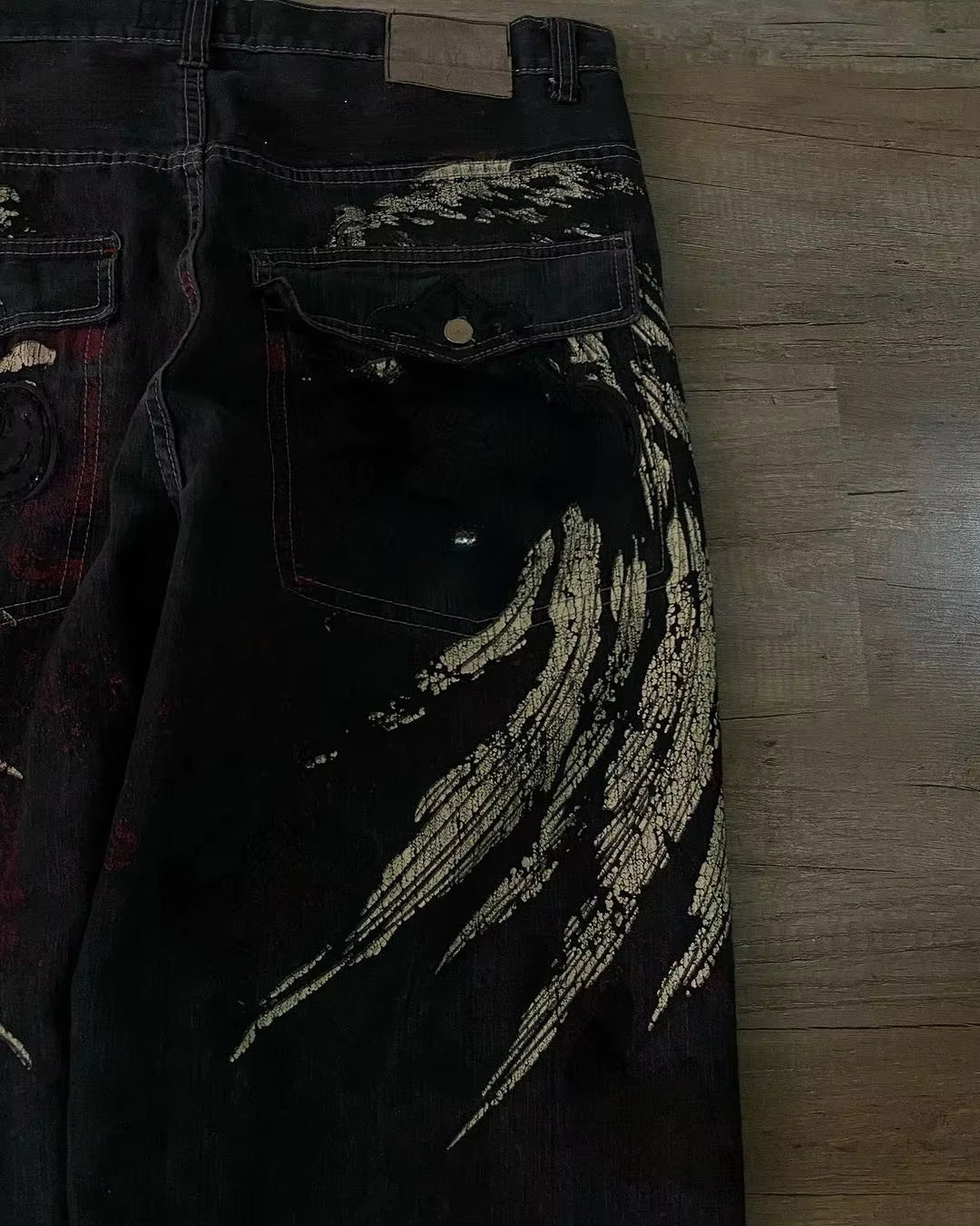 High waist gothic Y2K Harajuku baggy jeans with retro wing embroidery, wide trousers from PressureDen.store