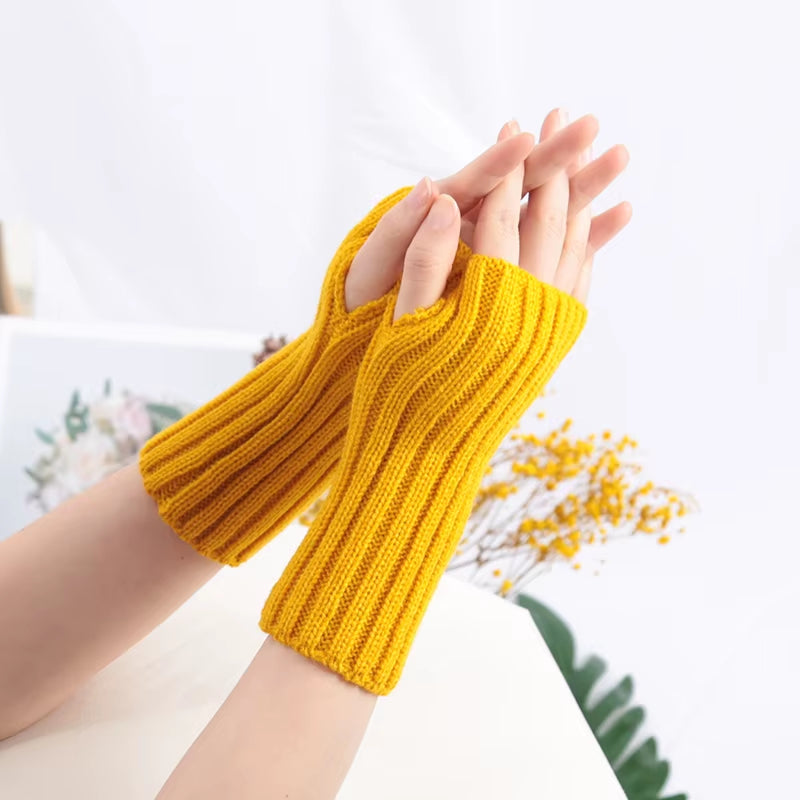Kawaii crochet fingerless winter gloves for women, goth lolita style arm warmers, stylish accessory for cold weather.