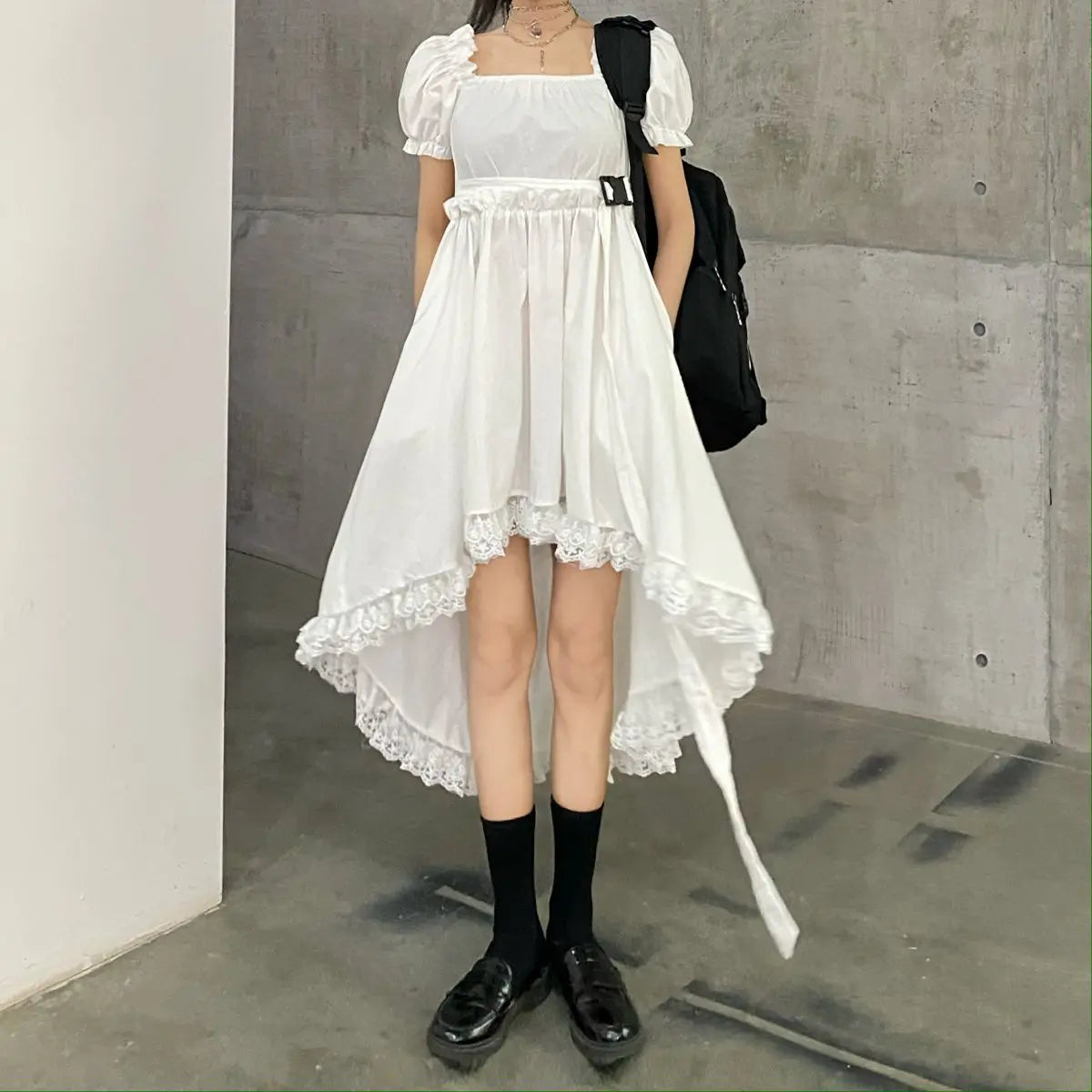 Y2K Harajuku Gothic dress by PressureDen.store featuring ruffles, mini length, and fairycore style for kawaii and e-girl fashion