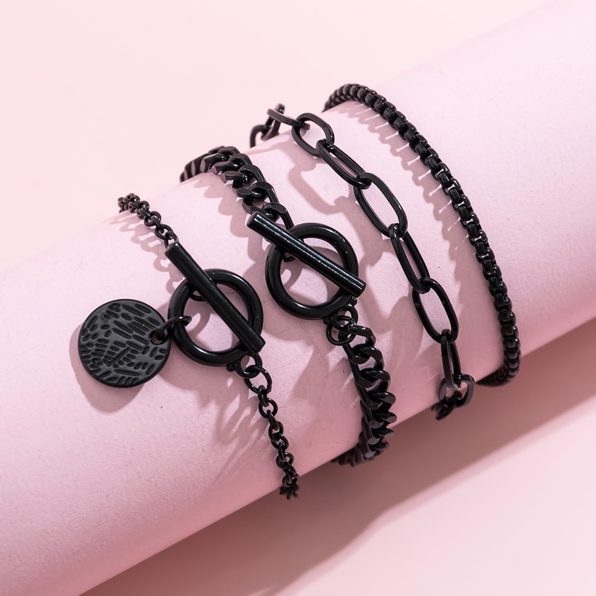 Stackable black Gothic bracelets set by SAVNOJW with gold coins and vintage chains, ideal for Y2K parties and Halloween accessories.