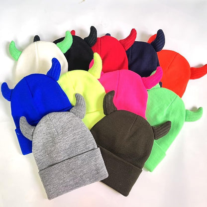 Y2K devil horn beanie by ZITEZHGO featuring black knit fabric with red devil horns, ideal for Halloween emo goth fashion.