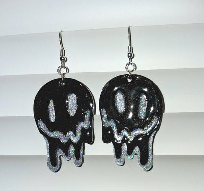 Melting smiley face earrings with dripping glitter design, trendy Y2K jewelry style, made for a happy, hypoallergenic look.