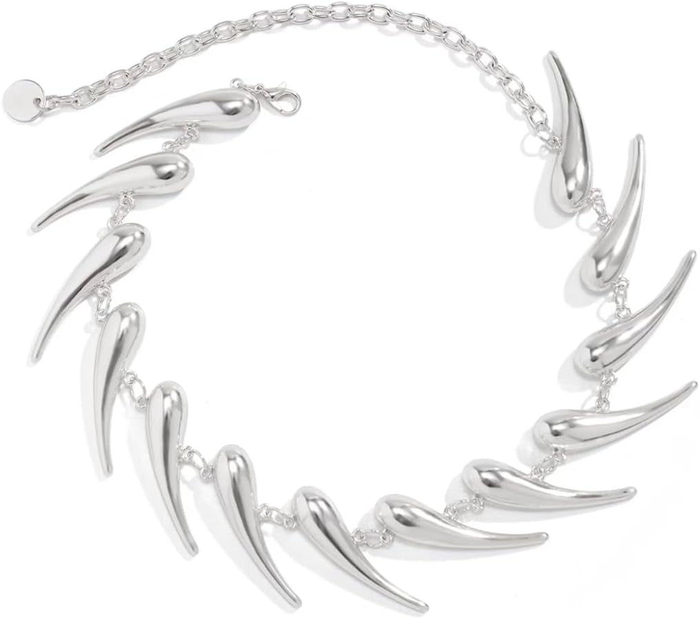 Handmade silver spike choker necklace by CheeseMine featuring a punk goth style, adjustable collar with edgy metal spikes.