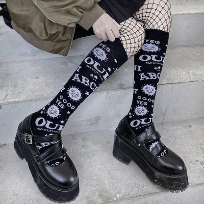 Gothic punk knee socks with star and moon design featuring retro Y2K Ouija board pattern for women and girls.