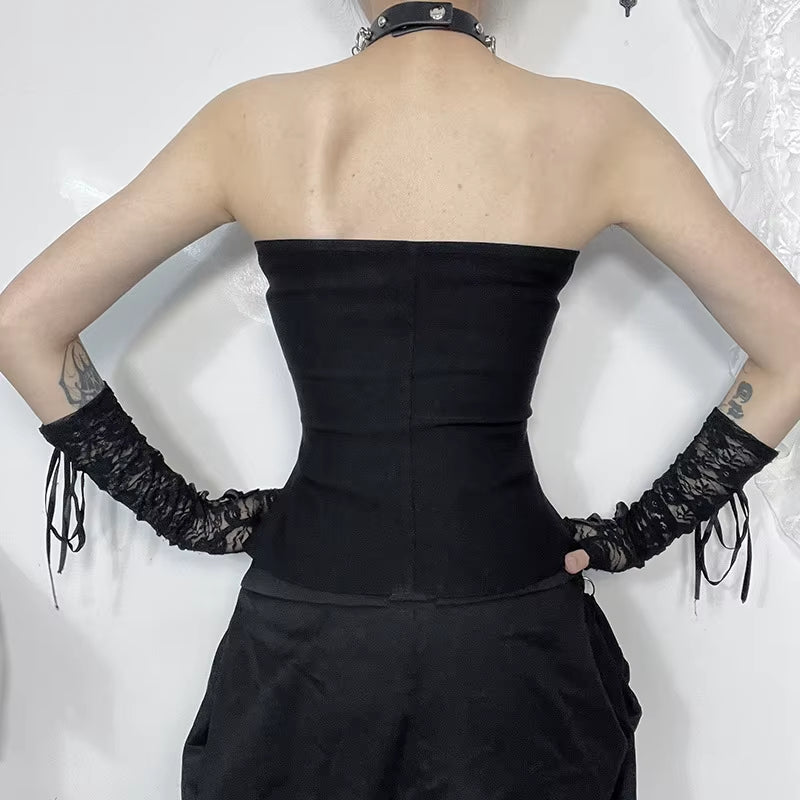 Black leather punk corset top with buckle straps, edgy Y2K coquette gothic streetwear vest, featuring buckles and strap details.