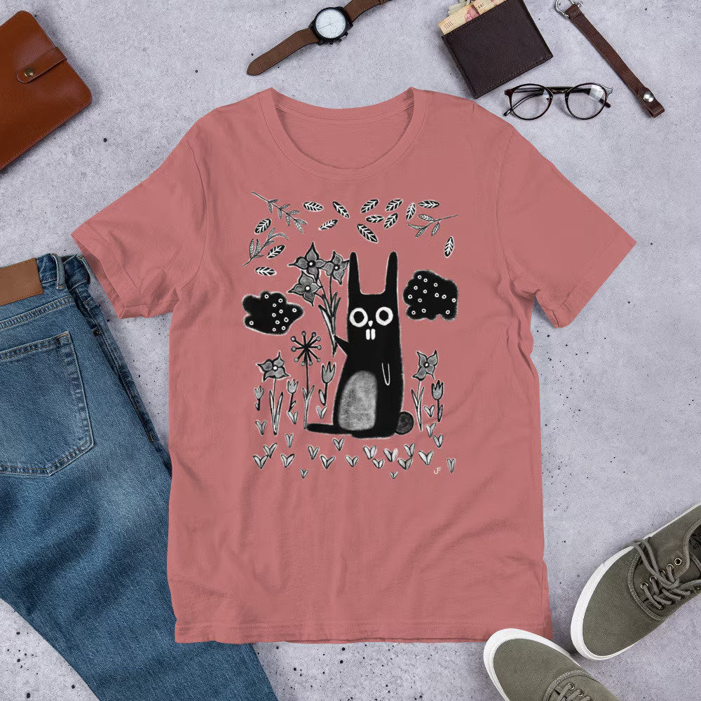 Whimsical garden rabbit T-shirt by PressureDen.store featuring a quirky gothic design, perfect for birthdays and housewarmings.