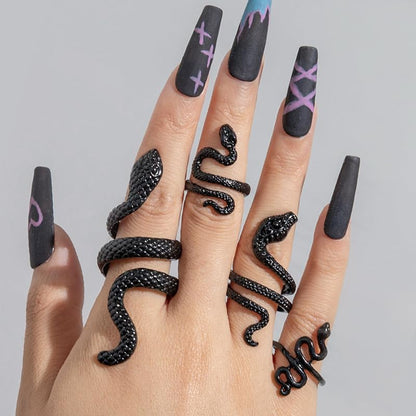 Adjustable black snake rings set by ONBRIG, vintage gothic punk jewelry for women, featuring multiple snake-shaped rings.