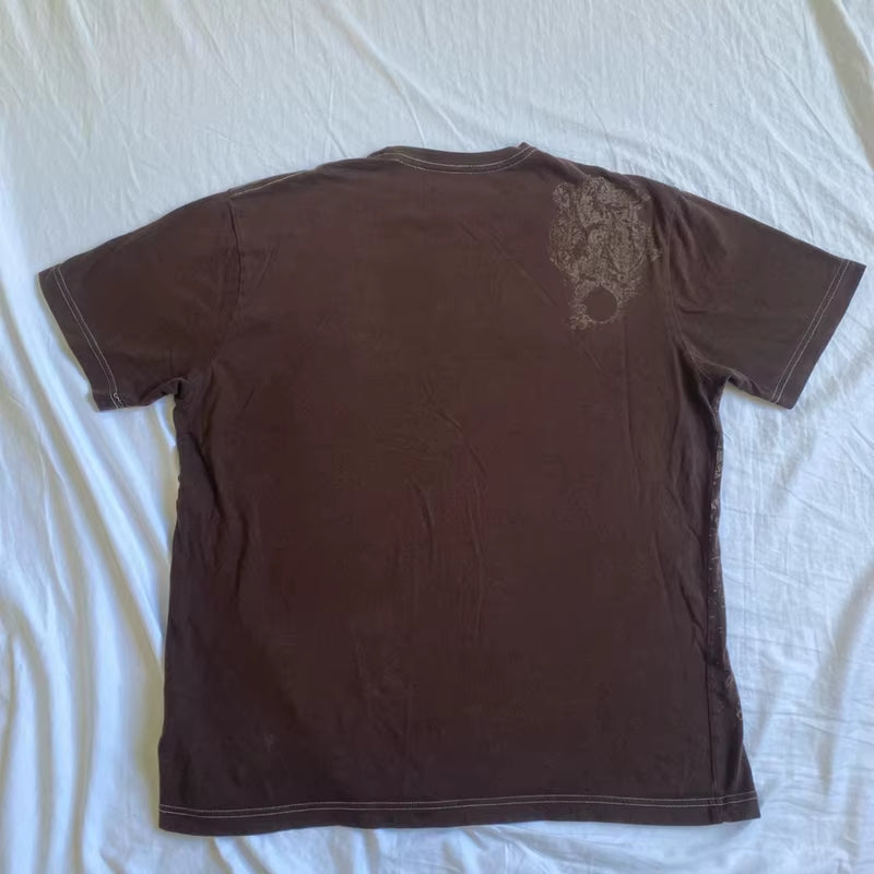 Retro Y2K graphic T-shirt by PressureDen.store featuring emo goth cyber grunge style in vintage brown, short sleeve, O-neck for men and women.